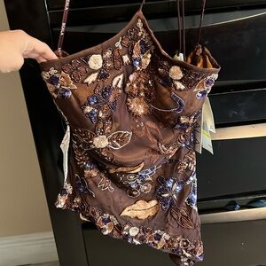 Fancy halter top. Beautiful sequence details. Brand new with tags. SCALA